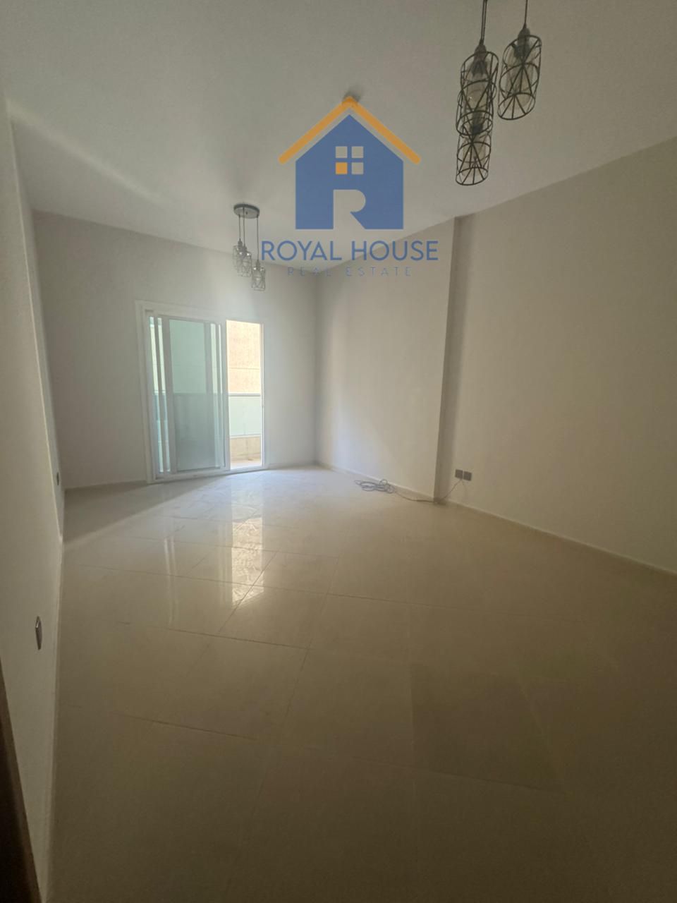 Two bedrooms and a living room with parking for sale in Al Qasba