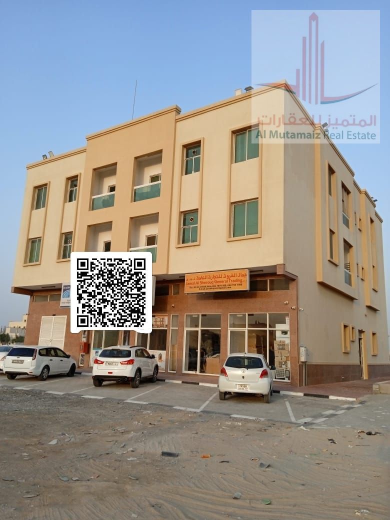 A spacious shop in Al-Jarf Industrial Area 3, on the main street.