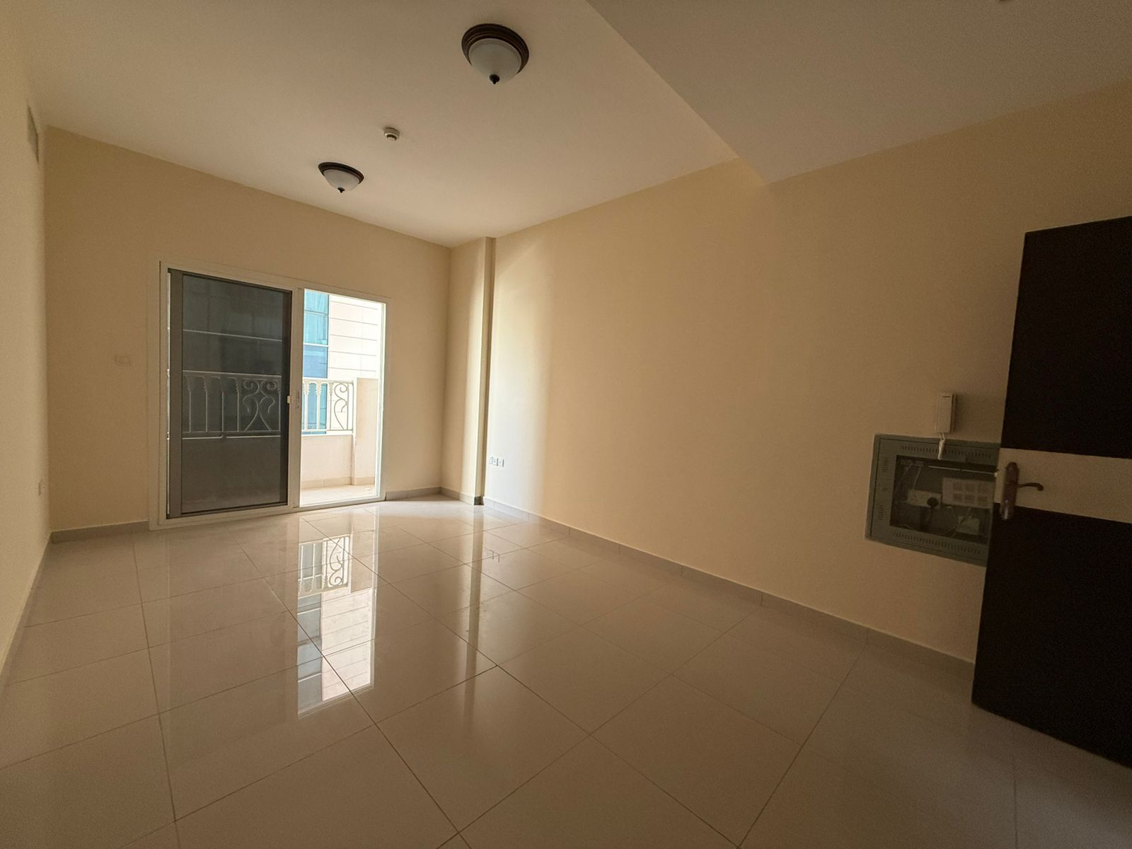 Most beautiful 2-bedroom apartment with a spacious living room, balcony, open view, and free parking in Al Taawun.