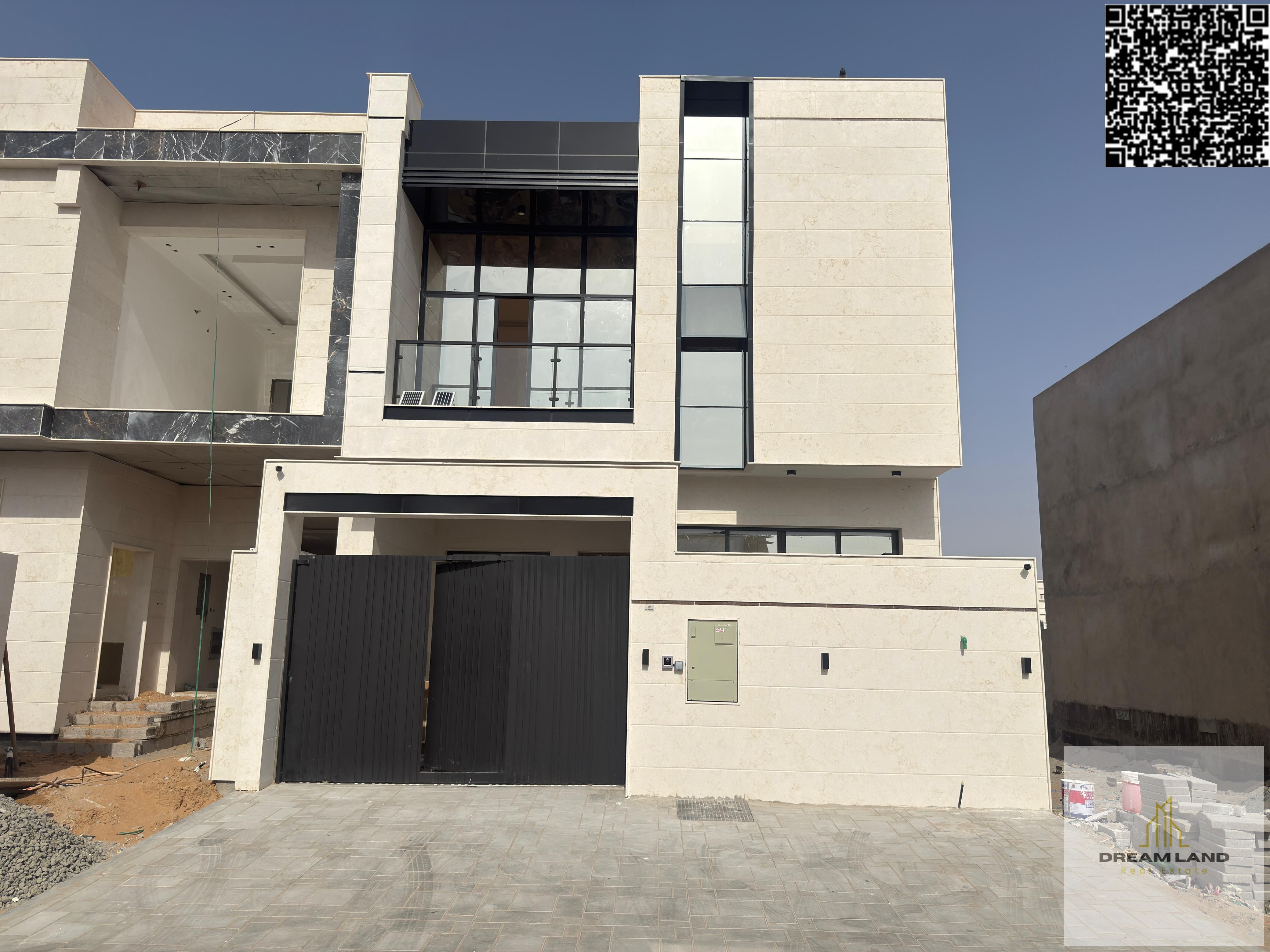 Direct from the owner, including all ownership fees: a villa in one of Ajman's most luxurious villas, built and finished to a super deluxe standard, w