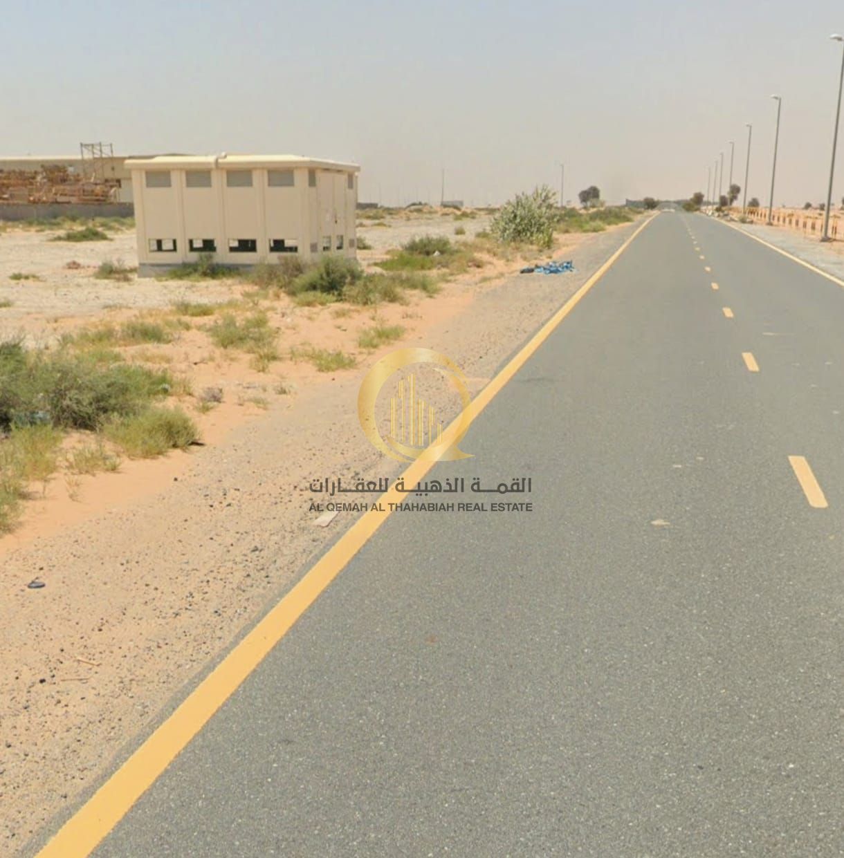 For sale: industrial land in Al-Sajaa, area 13,616 sq ft, prime location, corner plot on two streets, freehold ownership for Arabs and 99-year lease f