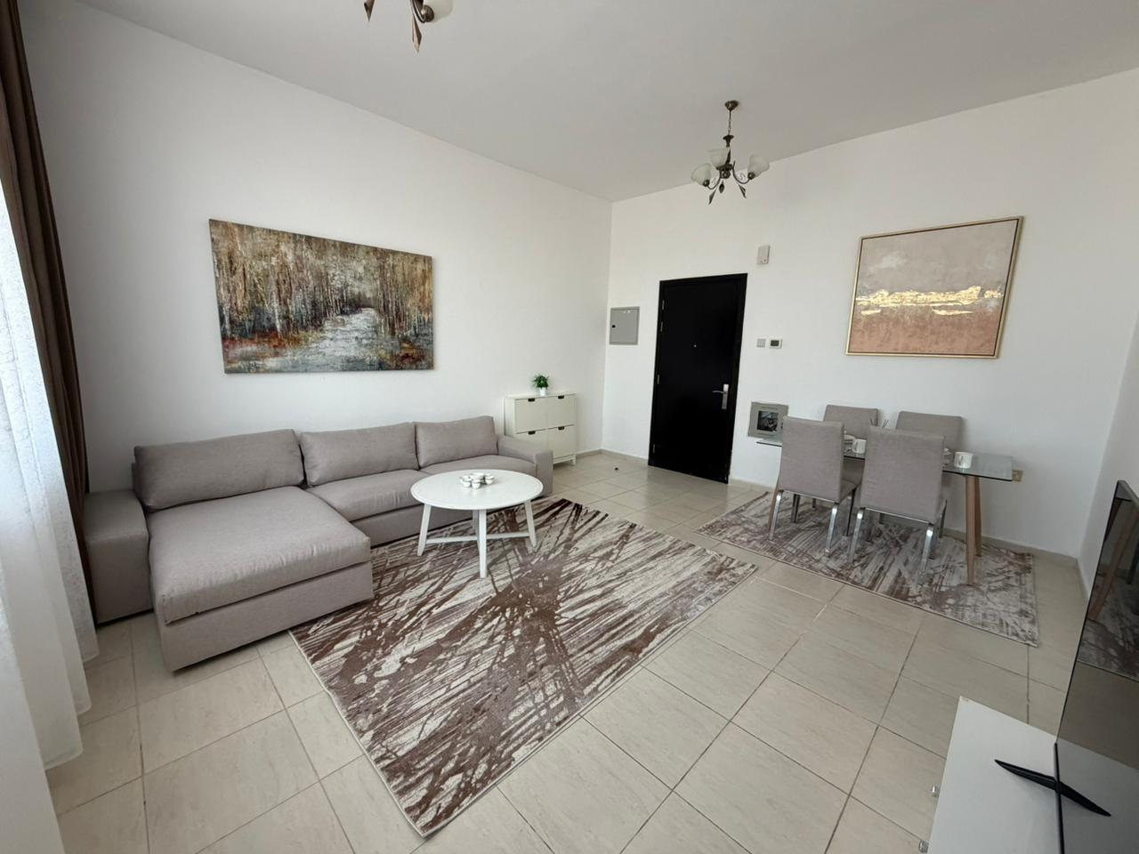 Furnished 1BR in Al Jurf 2, opposite Ajman University, first tenant, all bills and parking included.