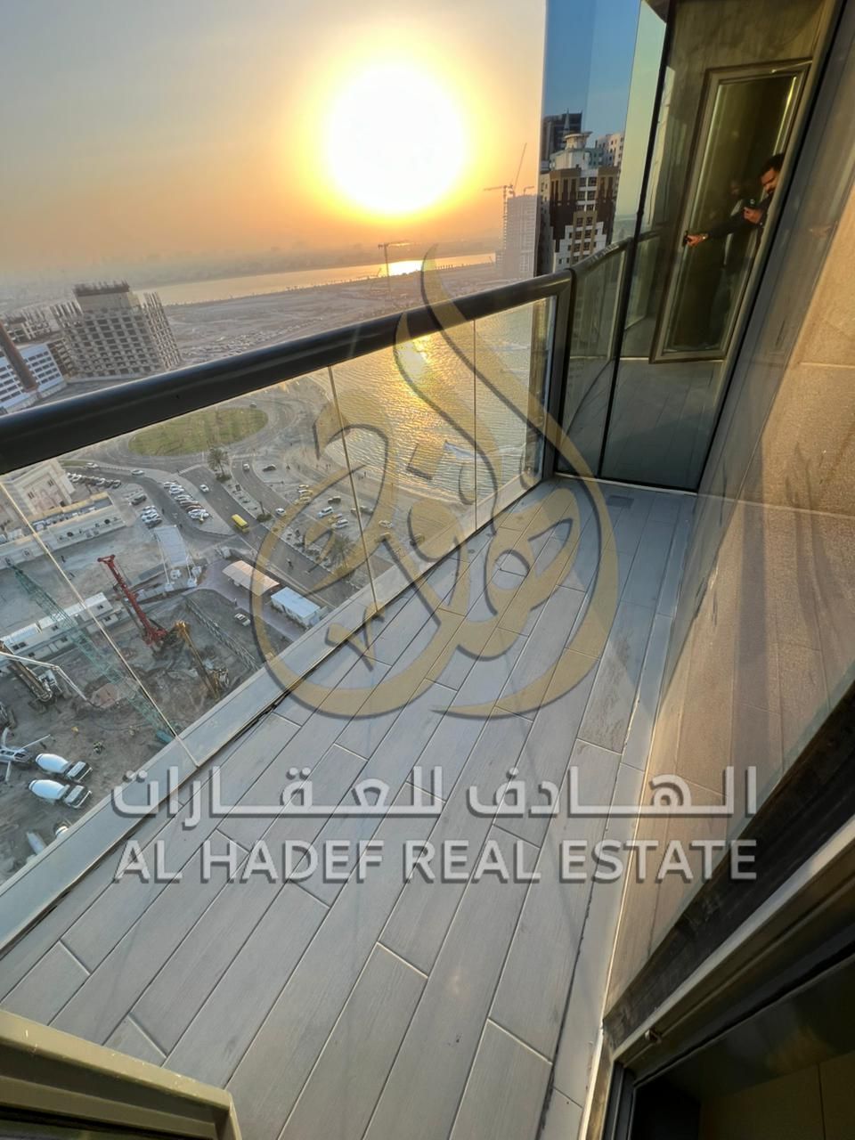 Two-bedroom apartment with a living room, three bathrooms, kitchen, balcony, and storage room in Al Mamzar Al Taawun – side view – gym and family pool
