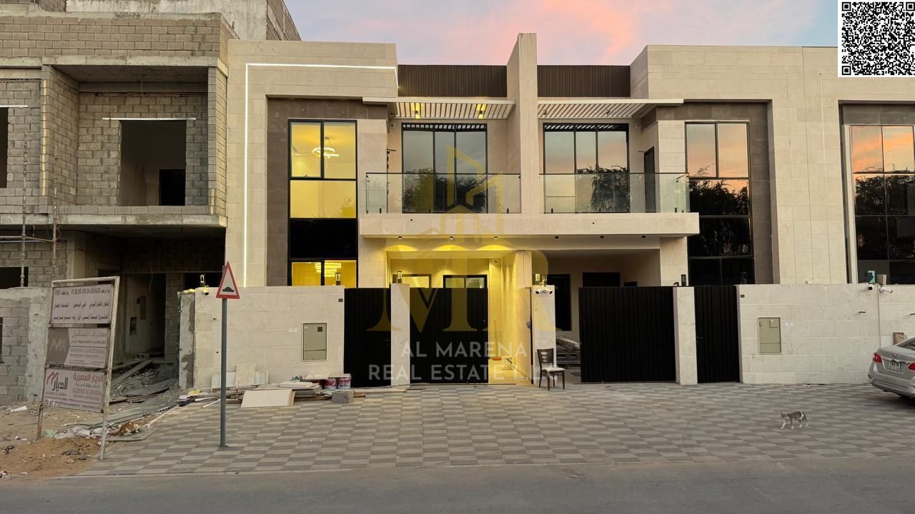 Luxury villa in Al Yasmin, Ajman, with registration fees included. Ready for immediate occupancy, featuring high-end finishes and spacious living area