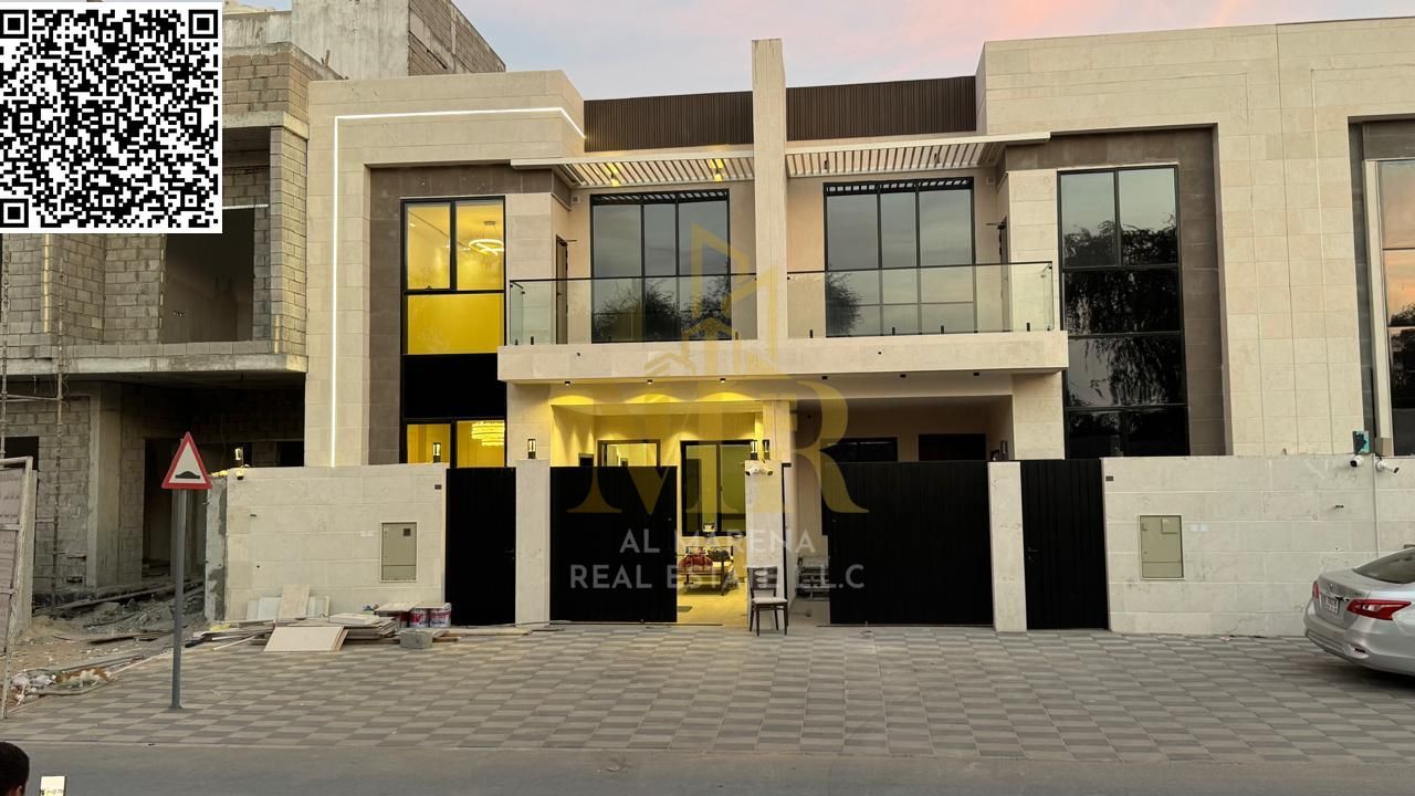 Luxury villa in Al Yasmin, Ajman, ready for immediate occupancy. The price includes registration fees and features high-end finishes and spacious livi