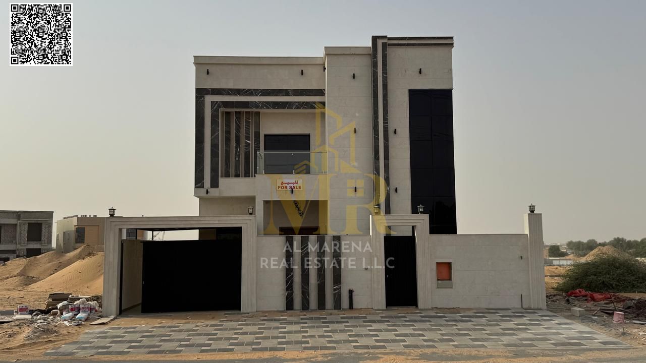 A villa with a price including registration and ownership fees on the main street, ready to move in, in the most prestigious areas of Ajman. Freehold