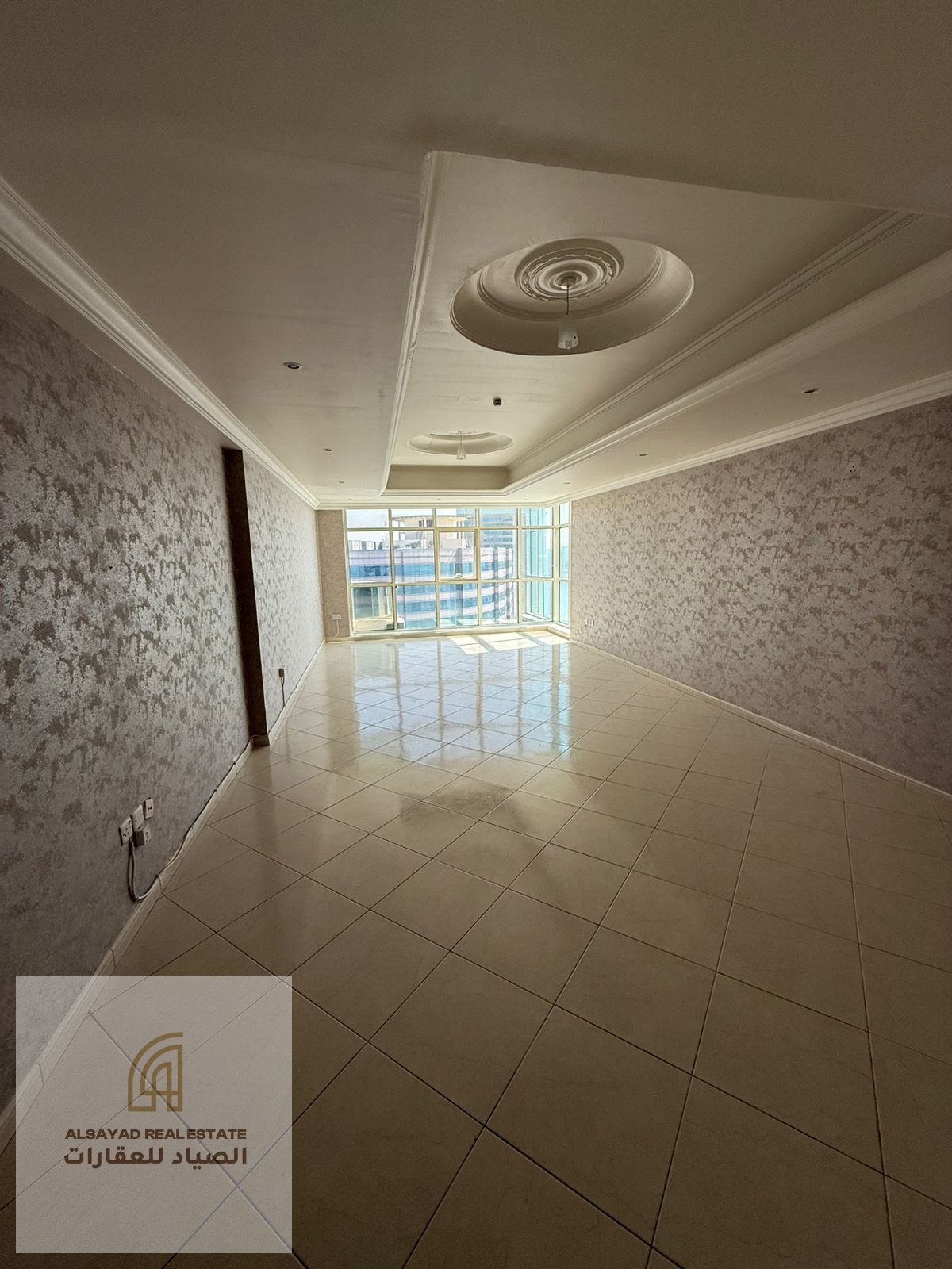 For sale: A distinctive apartment with a view of Al Khan and Al Mamzar beach, consisting of 3 bedrooms, a living room, and parking, close to all servi