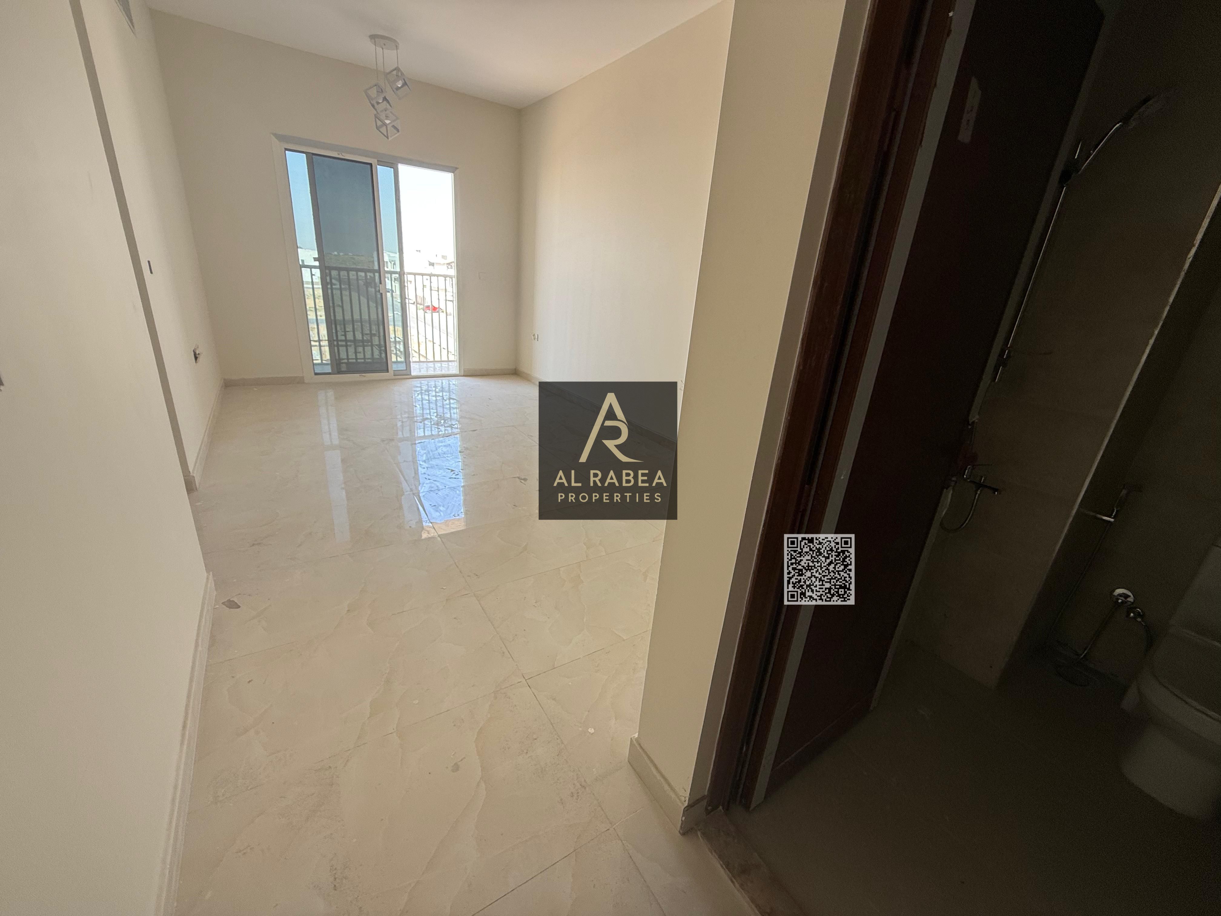 "Al Yasmeen, first occupant Model 4 One-bedroom apartment with a living room, two bathrooms, and a balcony with an open view. Price: AED 38,000 payabl