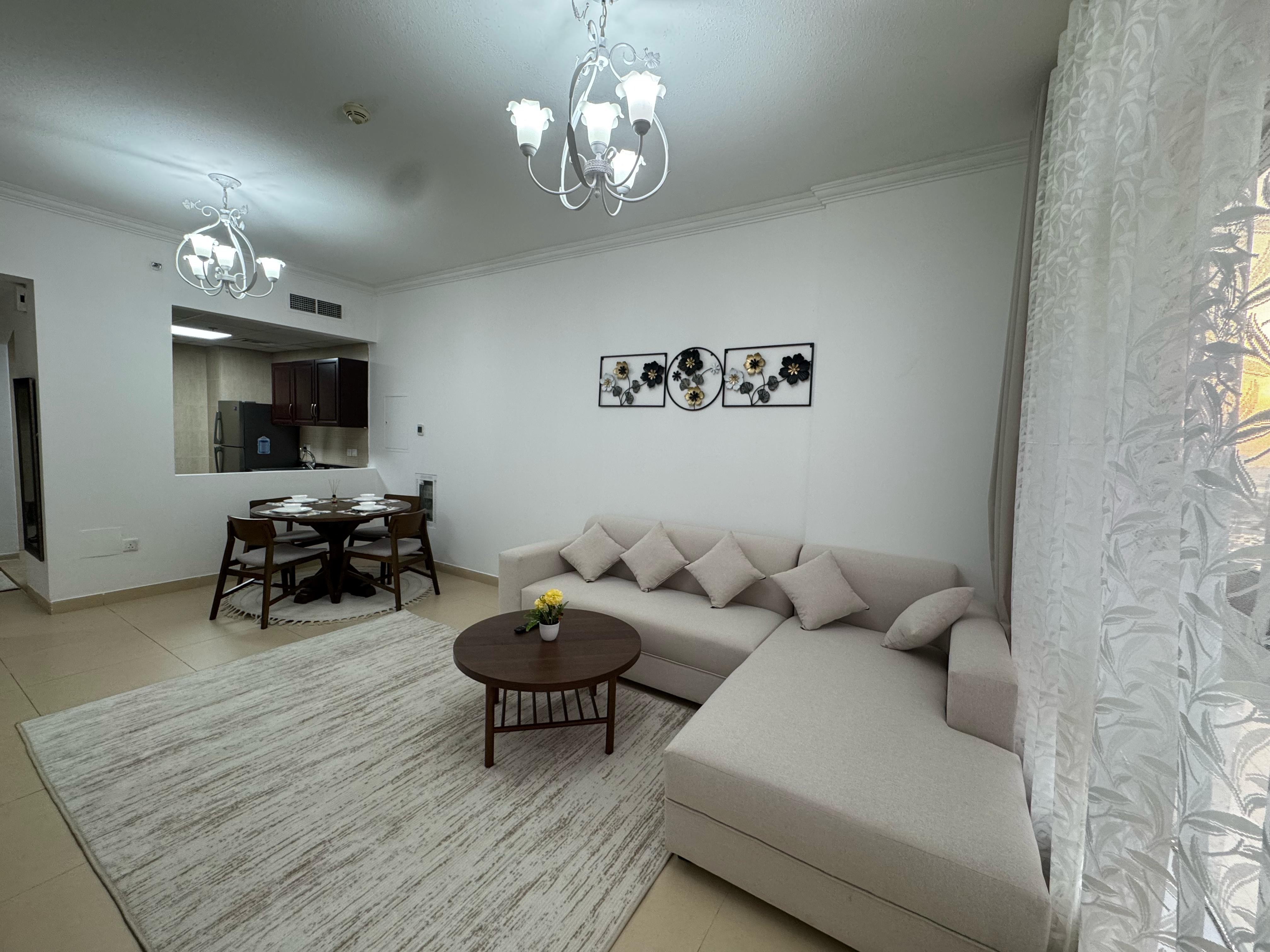 One bedroom and living room for monthly rent, first occupancy, in Al Yasmin Towers