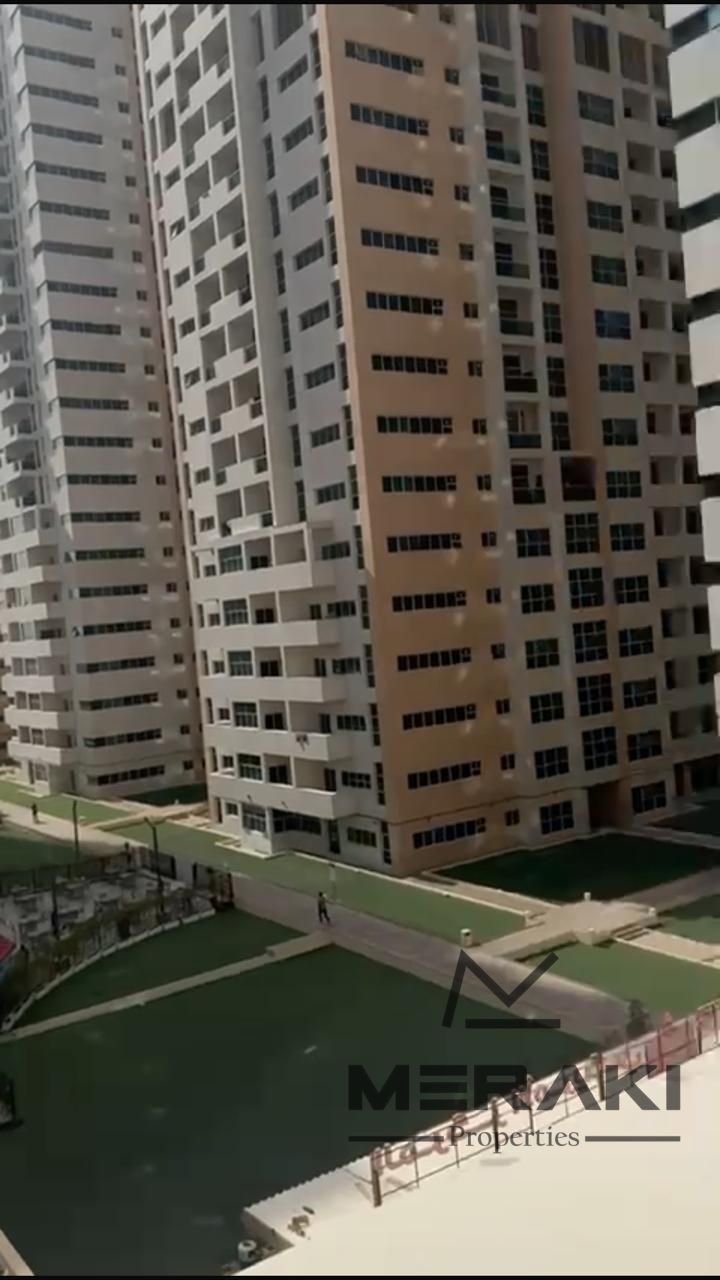 1 Bedroom Apartment + Laundry Room for Sale in Ajman One Towers – Partial Sea View