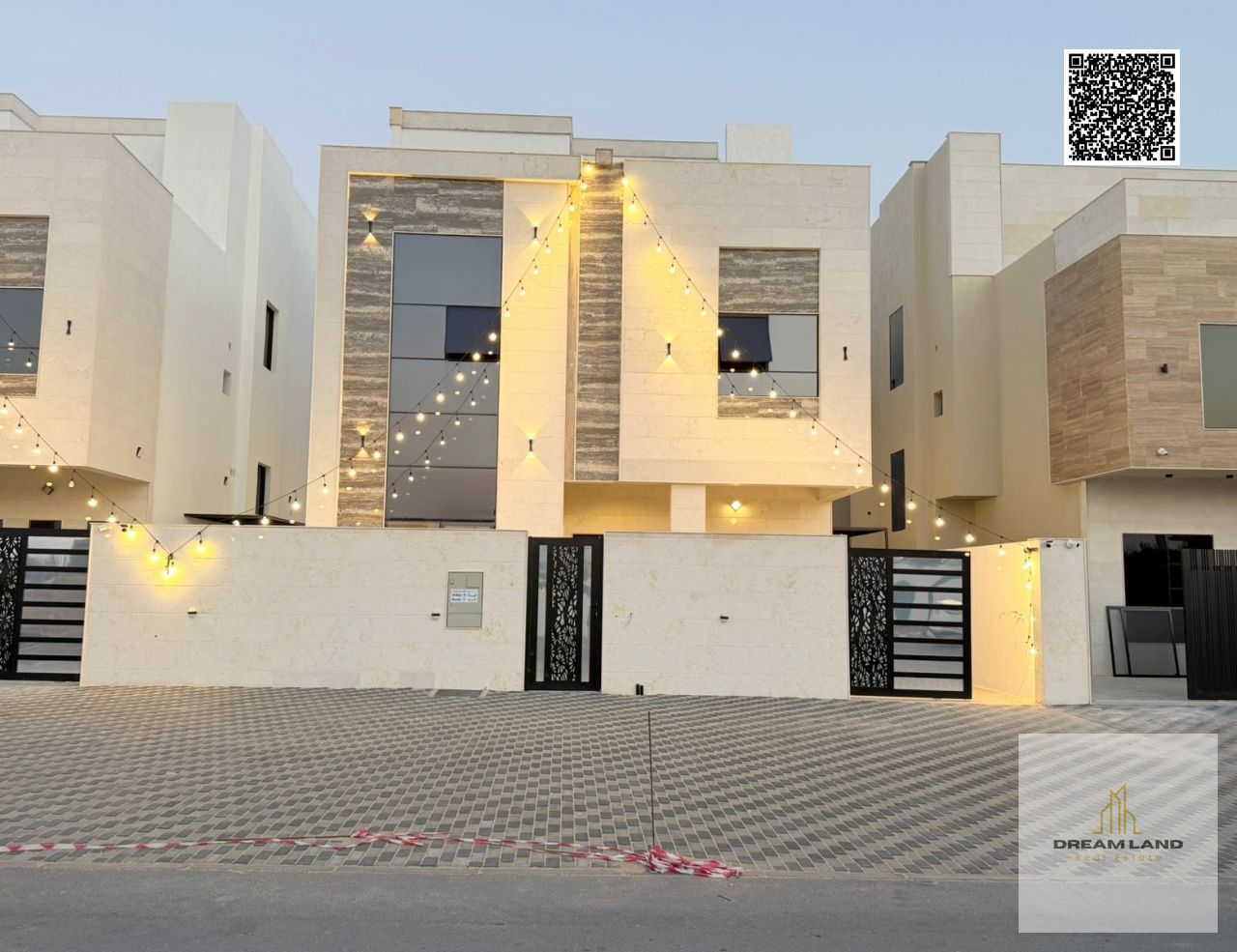 Modern European-style villa for sale in the Helio area, Ajman. Excellent location opposite the mosque. Two floors plus a rooftop. Registration and own