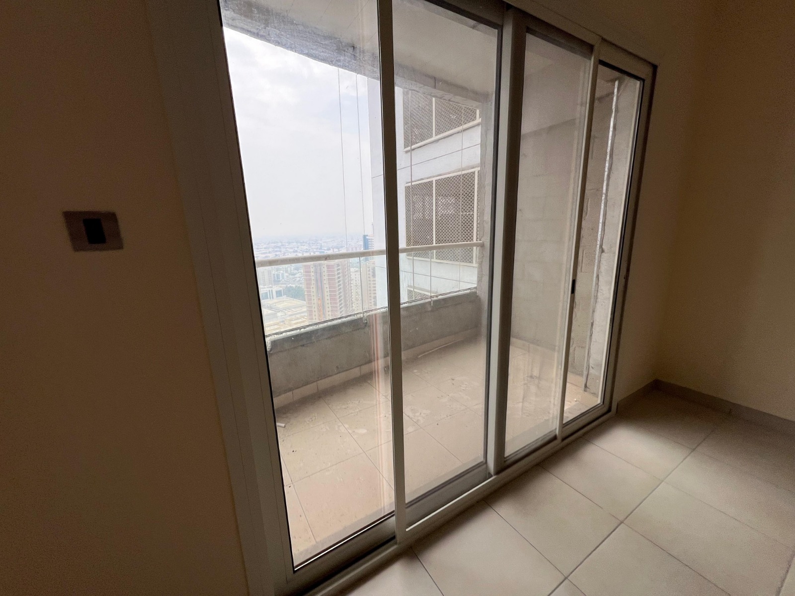 2BR apartment in Al Khan with back view, parking, gym, pool, and flexible payment options.