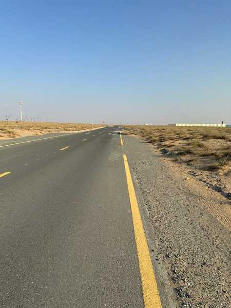 Commercial land for sale in Rawdat Al Qurt area, Sharjah