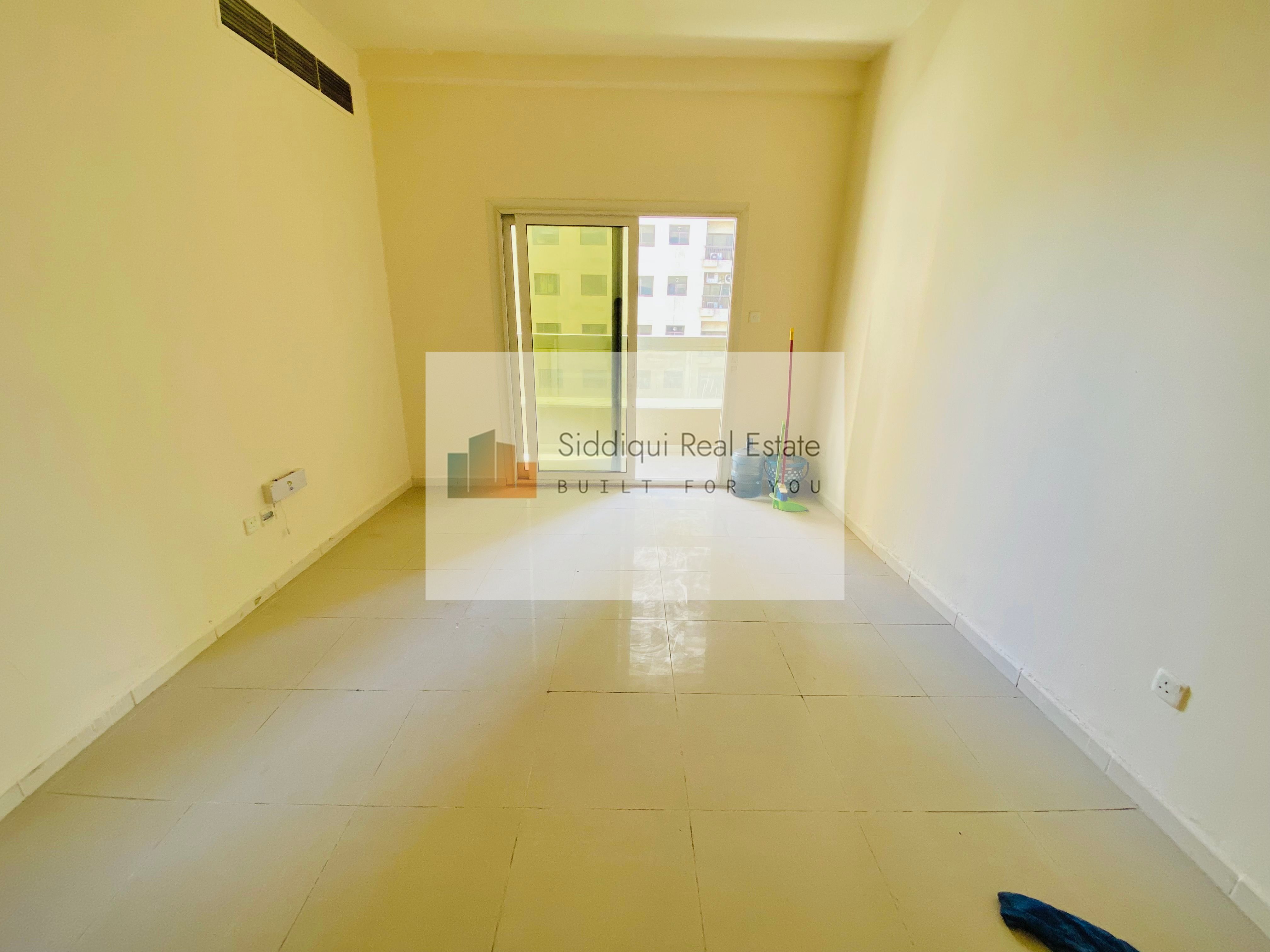 Spacious 2bhk with balcony separate hall close to Dubai exit available in Al Nahda Sharjah