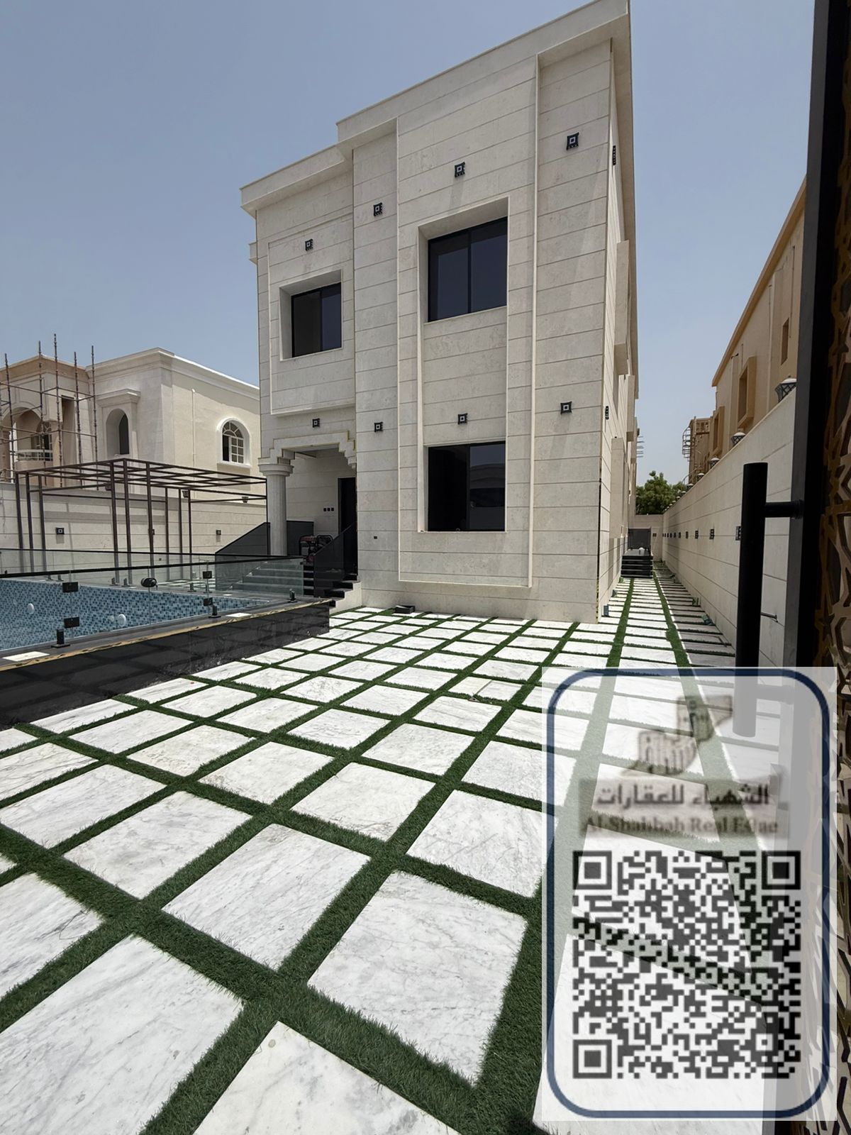 Al Rawda villa, freehold, private swimming pool, directly in front of the mosque, includes electricity, water, and air conditioning.