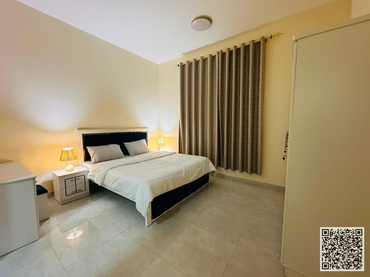 A fully furnished two-bedroom apartment with elegant and tidy furnishings is available for monthly rent in Ajman - Al Nuaimiya 2 area, including bills