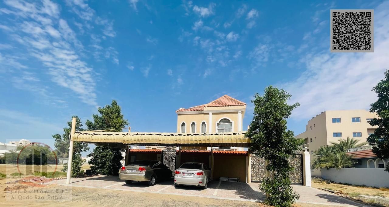 Villa for sale in Ajman, Al Rawda area. 5 master bedrooms, living room, majlis, and maid's room. Open to all nationalities. Bank financing available.