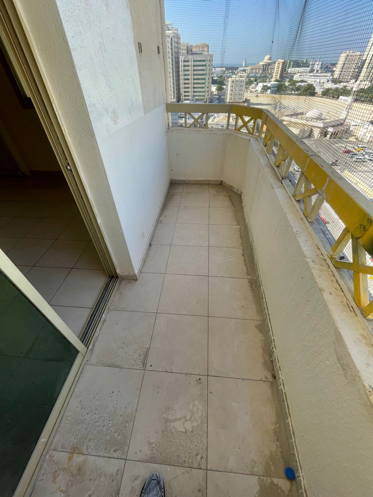 For rent 2 bedroom apartment in Al Mureijah Sharjah, 2 bathrooms, balcony and central AC, prime location near services and shopping.