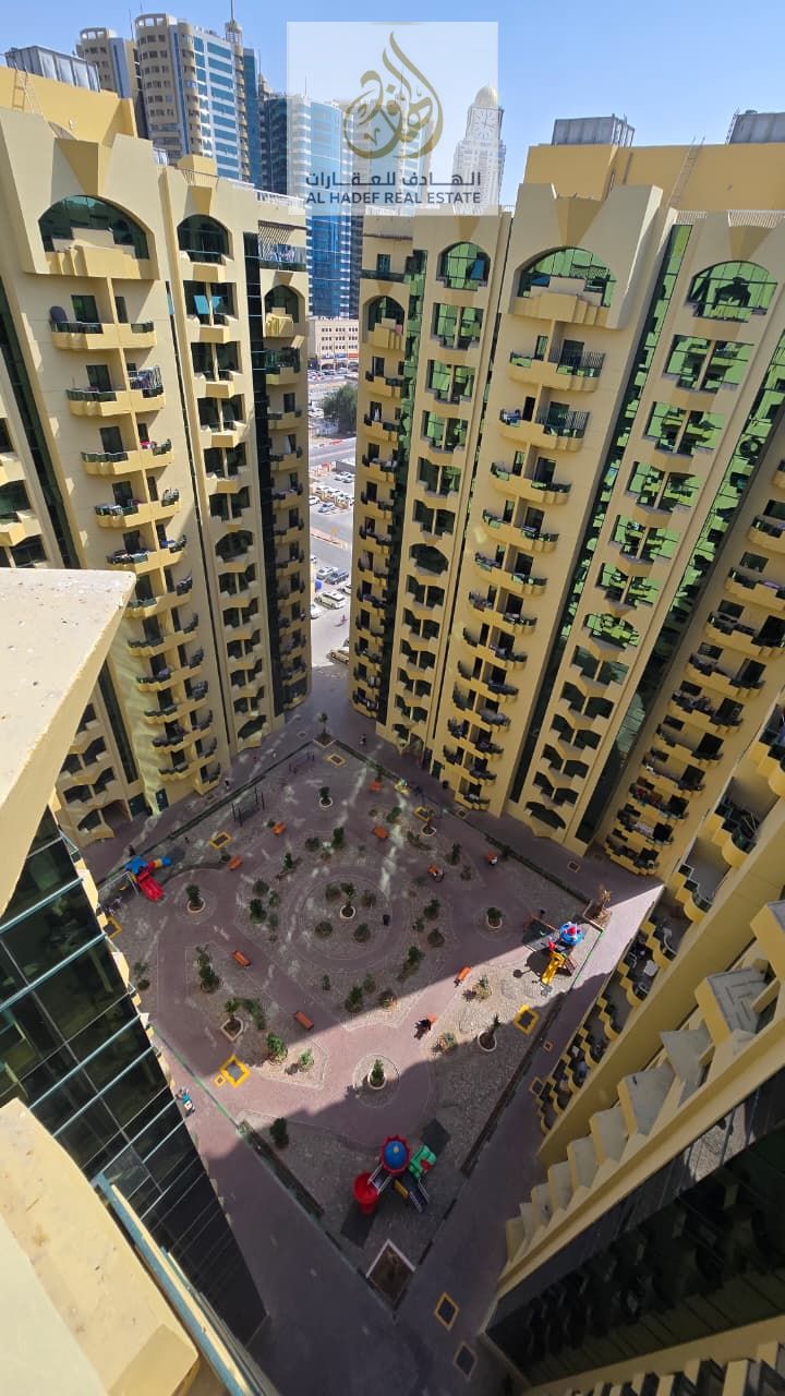 For annual rent: Spacious two-bedroom apartment in Al Rashidiya Towers, located in Ajman, directly opposite Nesto Hypermarket, offering a prime and co