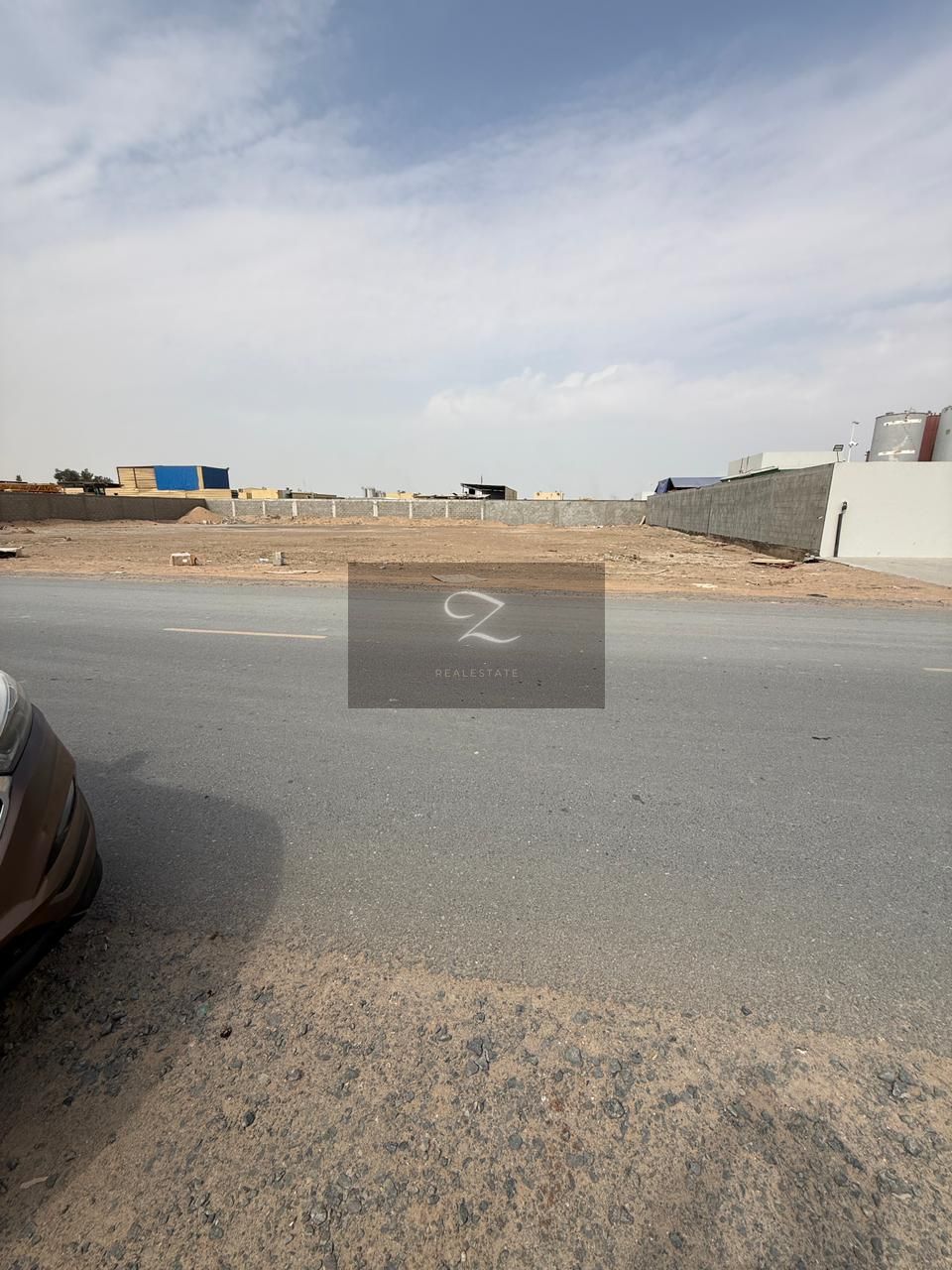 empty land for sale in Sharjah – Al Sajaa Third plot from Ali Mousa Street