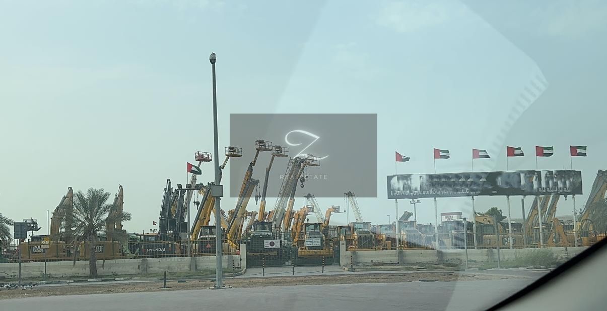 For sale land in Sharjah / Industrial _ area (10). on main Street with a width of (24) meters in the center of the scrap market