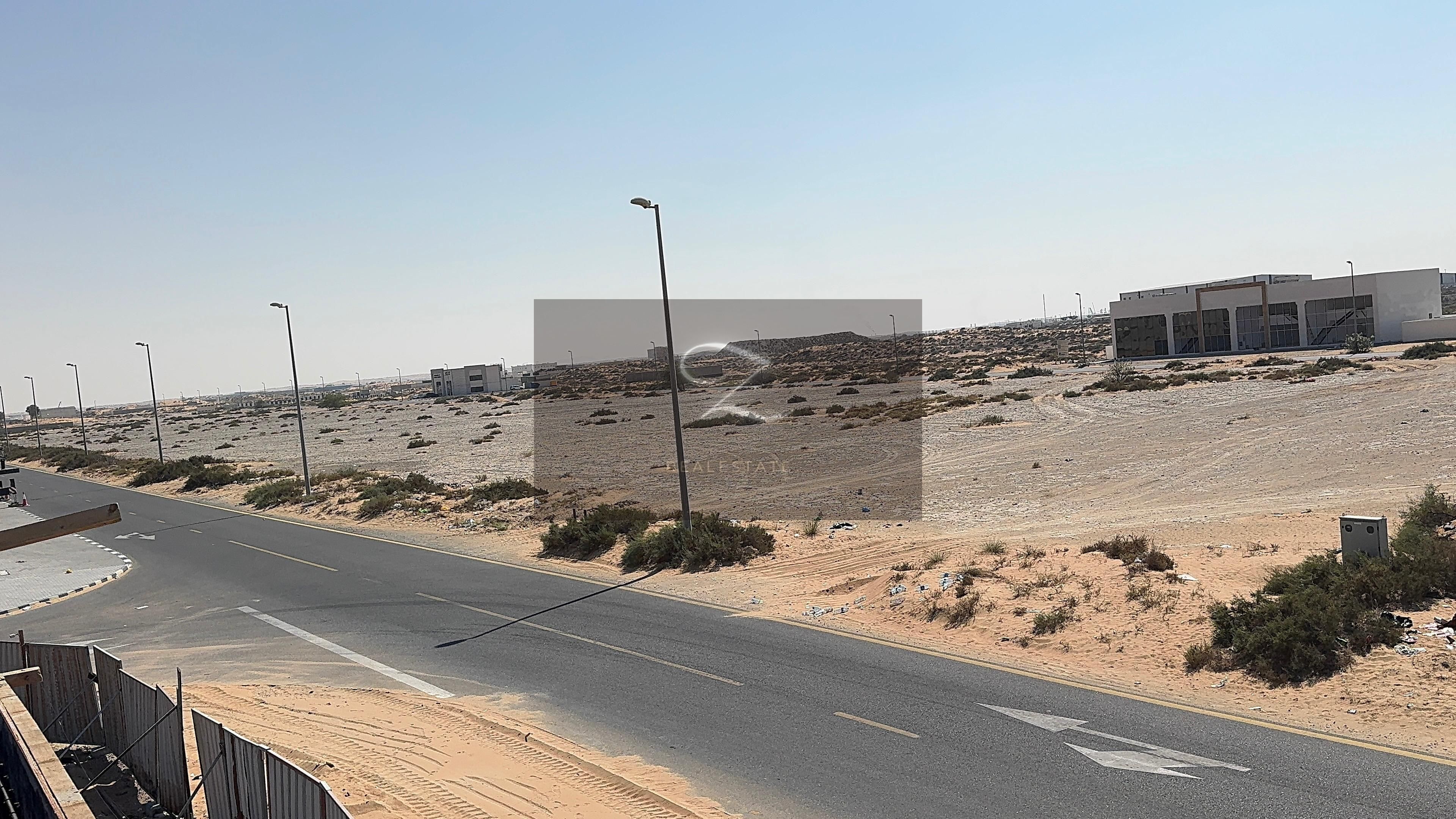 For sale industrial land in Sharjah / Sajaa Al Hanoo area the second row of the main street