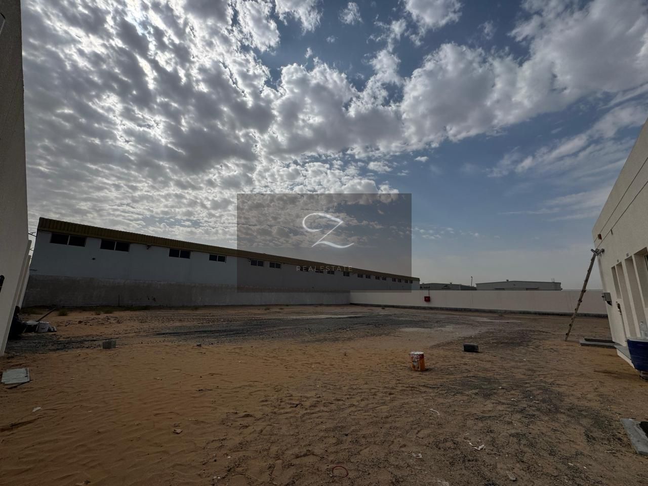 For annual rent a new walled land in Sharjah / Al Sajaa Emirates Industrial City Al Hanoo