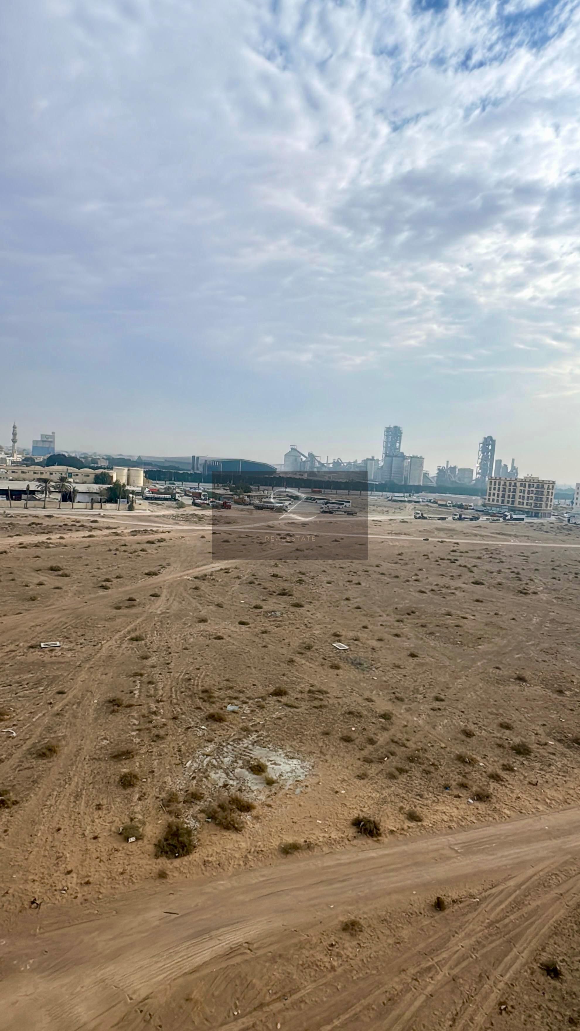 For sale: Residential/commercial corner plot in Sharjah / formerly known as Juwaizah Al Malha