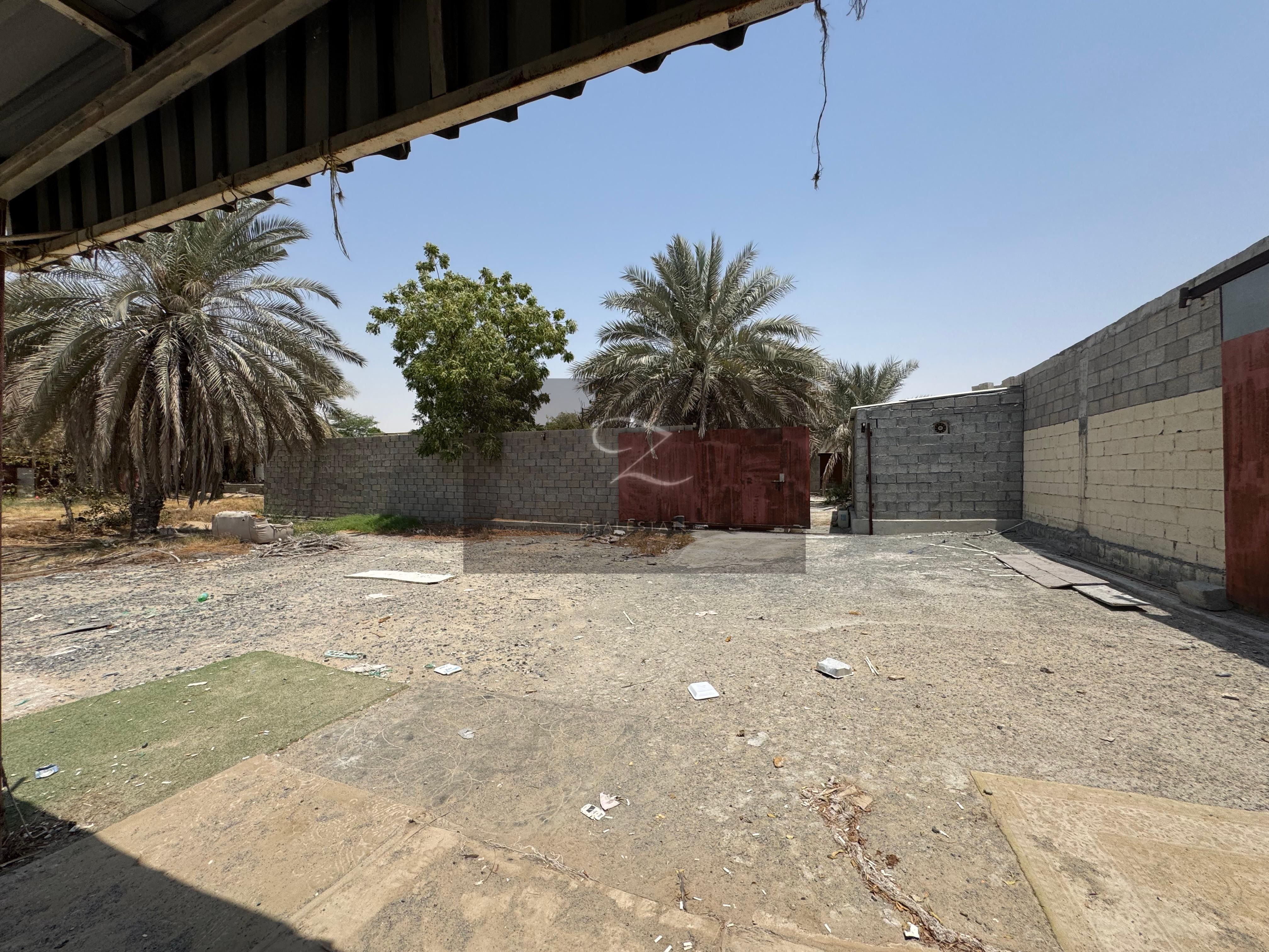 For sale: Corner farm in Sharjah / Al Falah Agricultural Area, Al Badia Suburb.