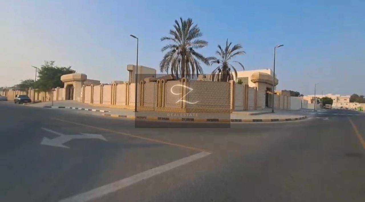 villa for sale in Sharjah / Al Tarfa corner plot on two main streets, close to Sheikh Mohammed bin Zayed Road