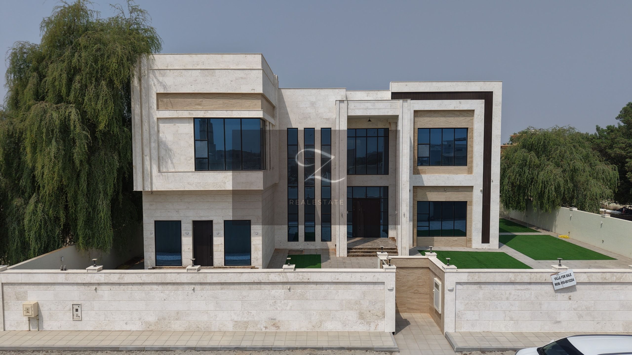For sale a luxurious villa in Sharjah, Al Ramaqia area, super deluxe finishing New first inhabitant corner