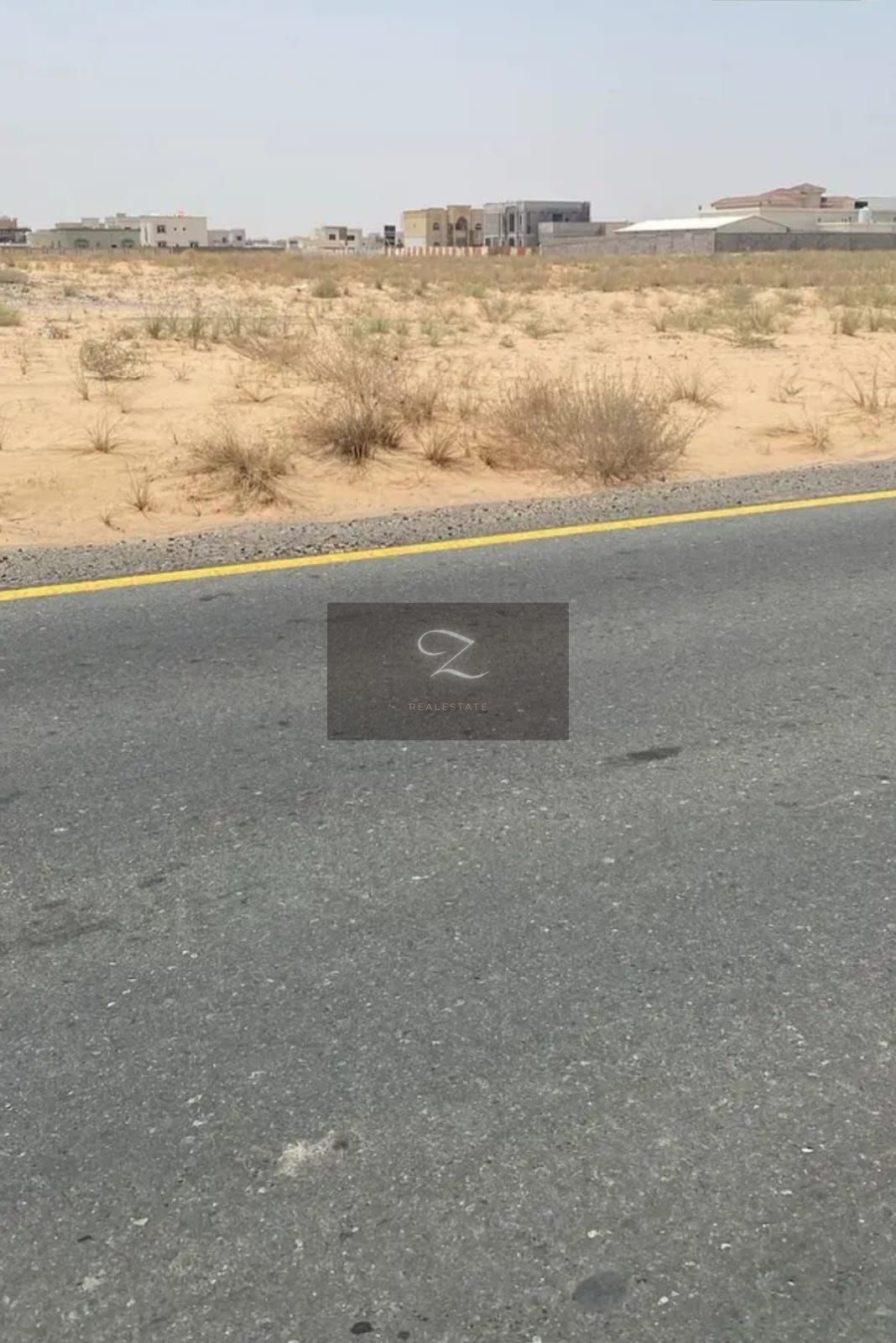 Corner plot for sale in Sharjah, Al Malha area, Juwaiza suburb.