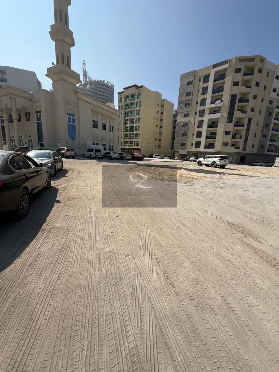 Land for sale in Sharjah / Al Khan Second plot from Al Khan Street