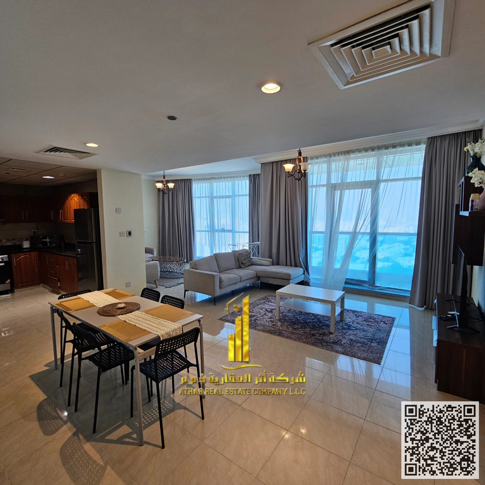 With an open view, a fully furnished two-bedroom apartment with a living room for monthly rent in Ajman Corniche Residence with gym, pool, and parking