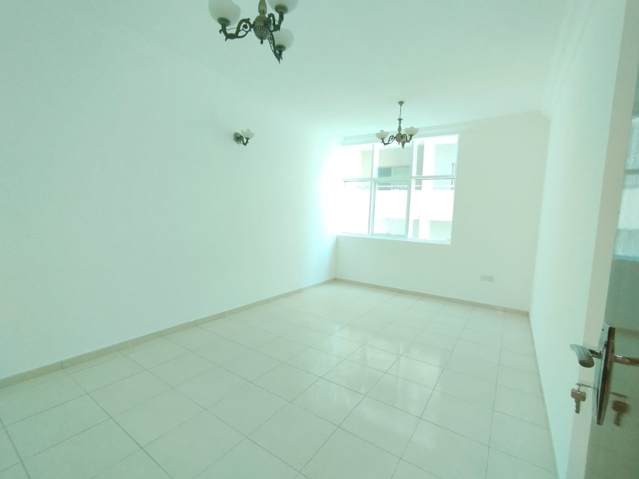 Hot offer SPECIOUS 2BHK WITH BALCONY,WARDROBE (15 Days free) EASY ACCESS TO DUBAI