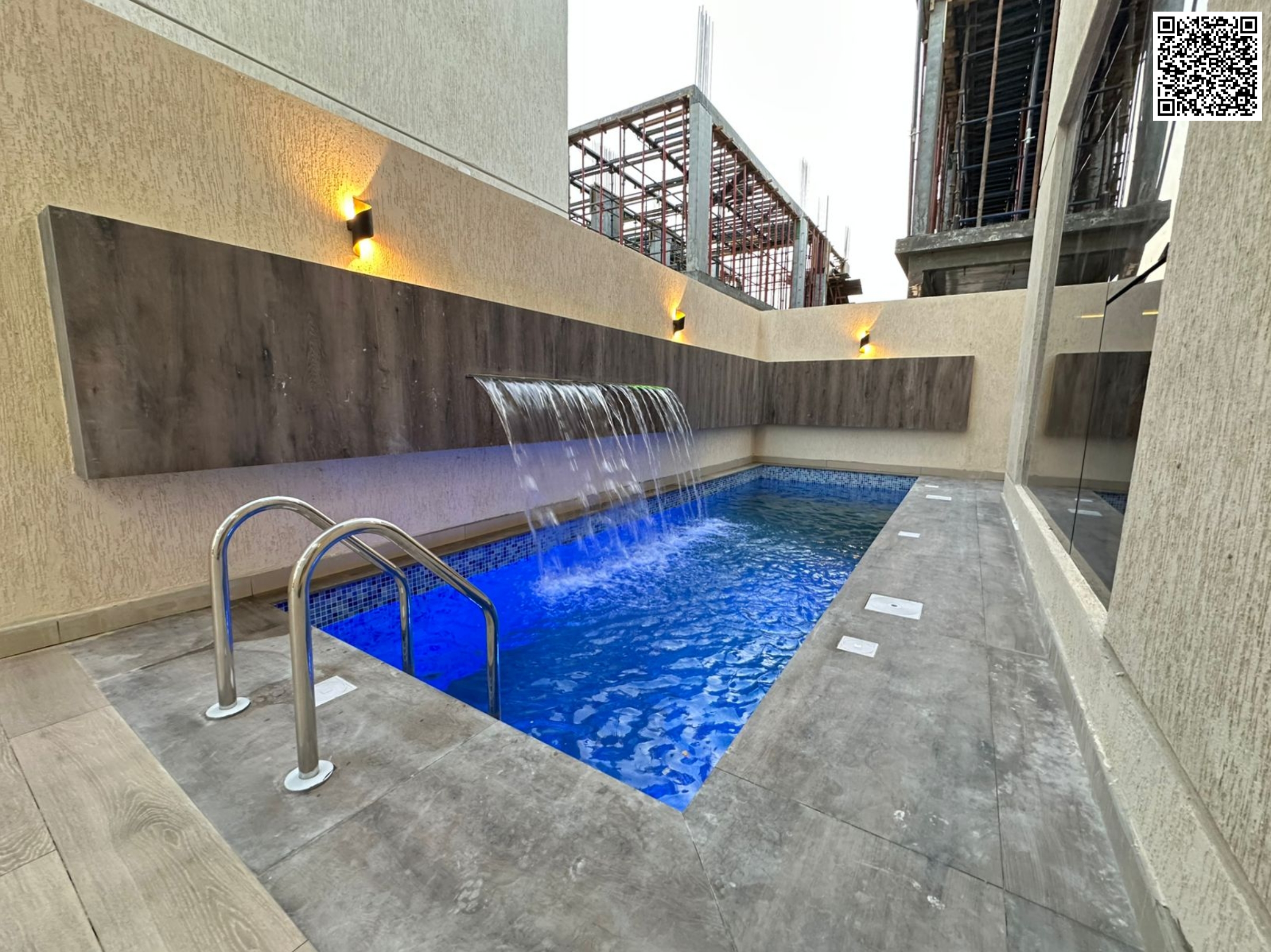 Includes electricity, water, and air conditioning. Two floors and a rooftop with an indoor pool. Freehold ownership for all nationalities.