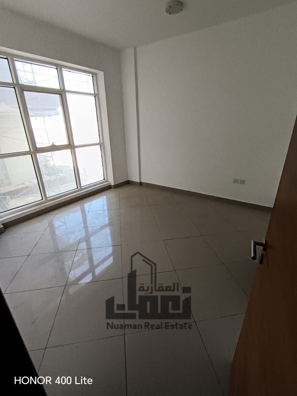 Master Bedroom Apartment for Rent in Muwaileh Commercial with Central AC and Prime Location Near Schools and Services