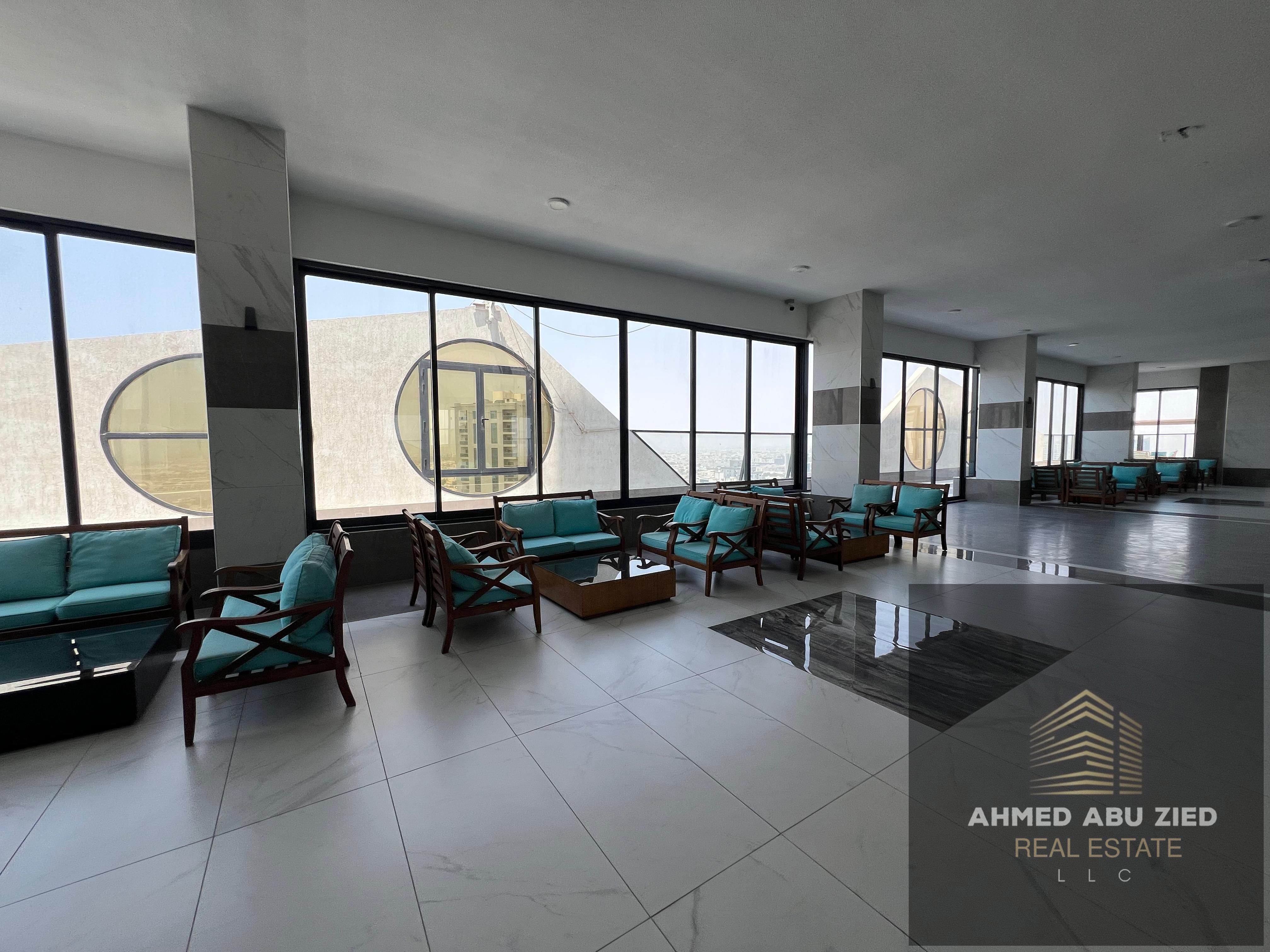 Luxury two-bedroom apartment for annual rent in Al Rashidiya, Ajman, featuring high-end finishes, full facilities including gym, swimming pool, and aq