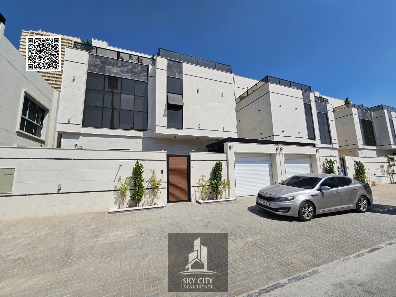 Modern Luxury Villa for Sale in Al Umrah - Ajman | Ground Floor, First Floor, and Roof, including water, electricity, and air conditioning. Freehold f