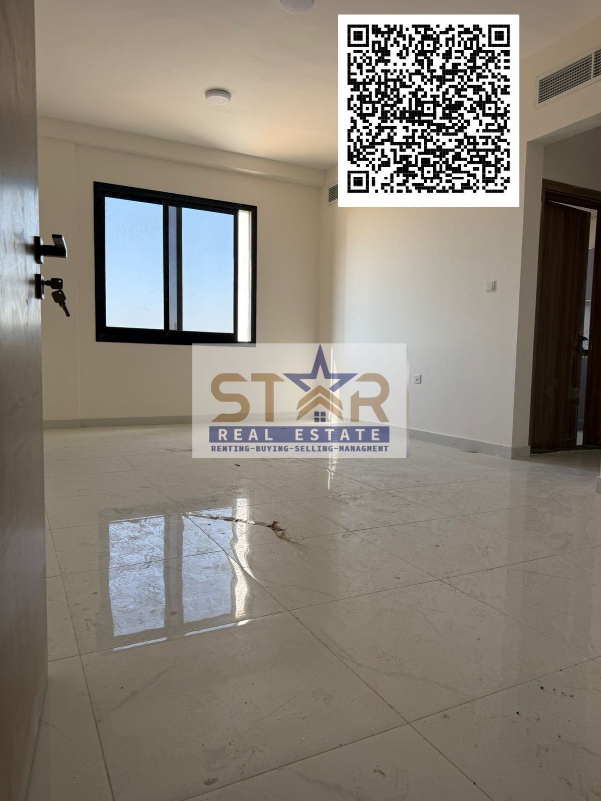 A bedroom and a living room in the Al-Aaliyah area, first occupant of a new building, standard rent in Ajman.