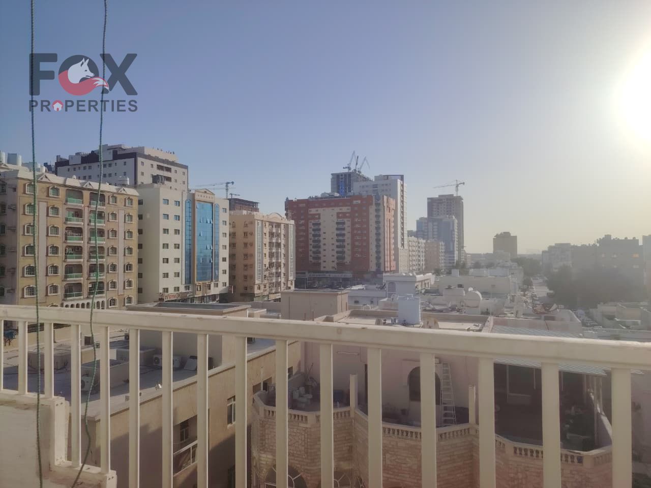 Two-bedroom apartment with a living room, balcony, and two bathrooms for annual rent in Al Nuaimiya 1