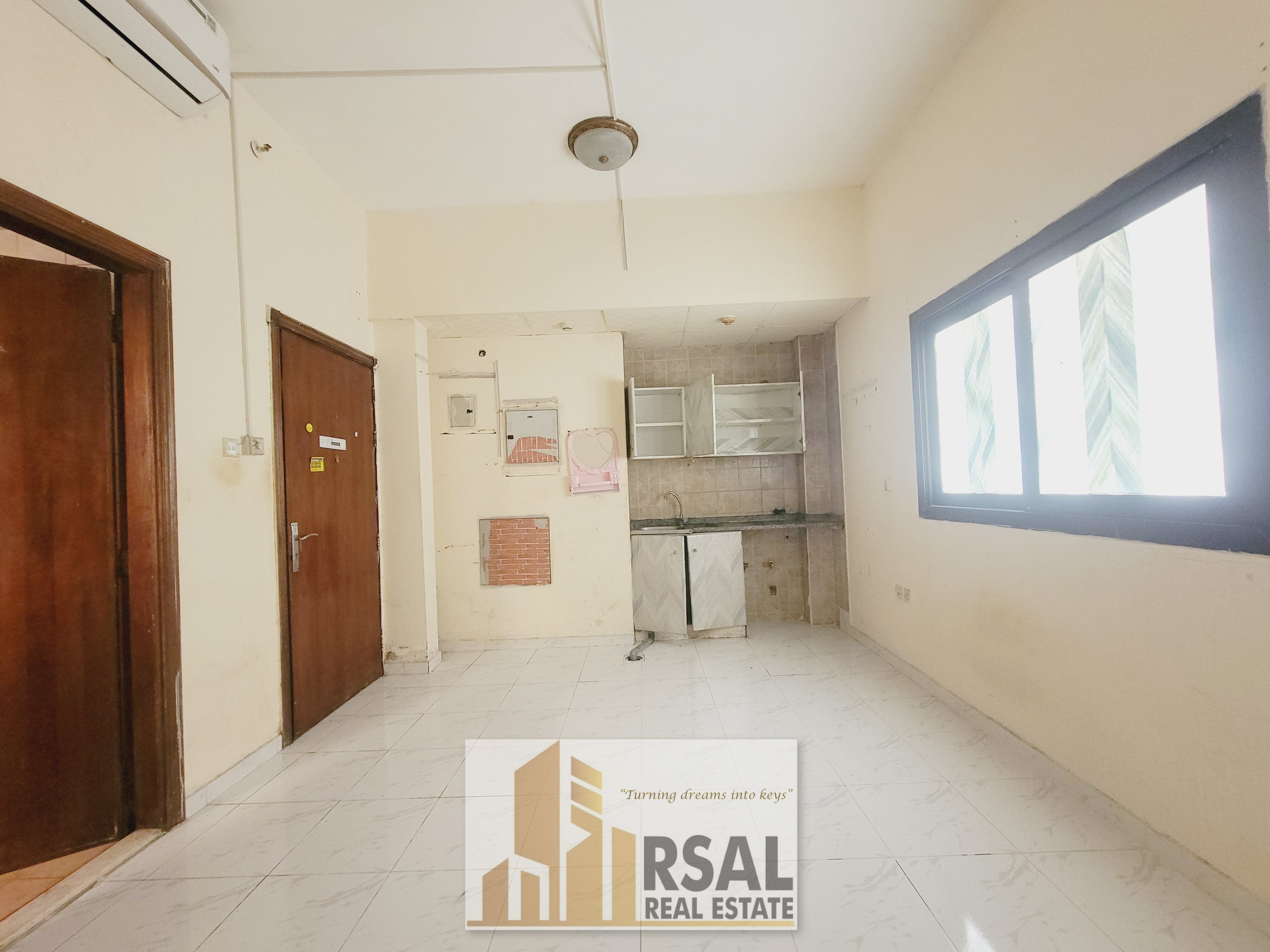 Biggest Size Apartment Studio flat// open kitchen// on road building// Very Close to Muwailah bus Station// no deposit Cash