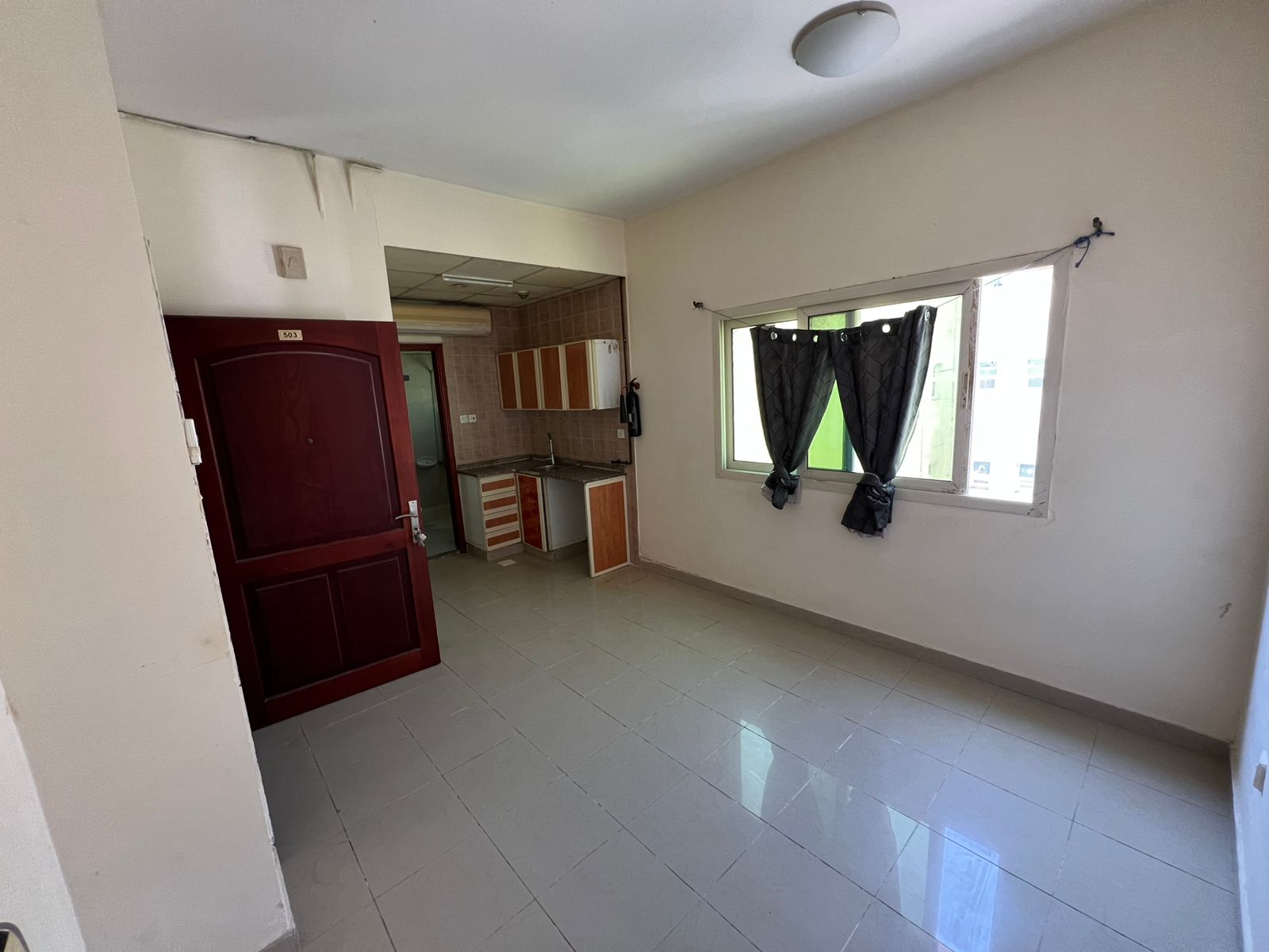Family studio with spacious area suitable for a small family in Al Boutinah, Sharjah Close to all amenities and shopping centers