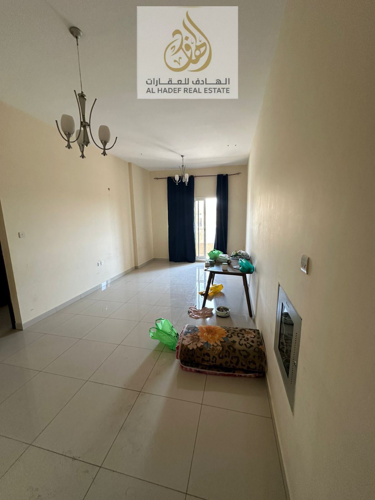 Annual rent in Ajman, Al Rawda 1 area, behind Al Hamidiya Police Station. The building is for families. It features a bedroom and living room with a b