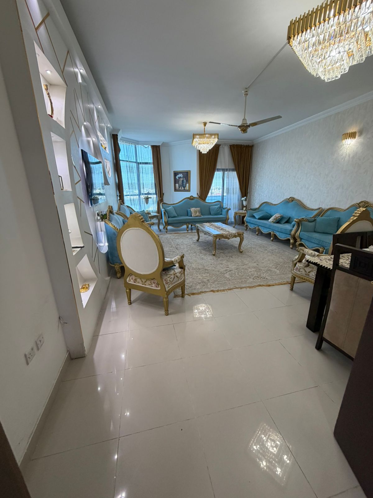 3 bedrooms and a living room with a full sea view
