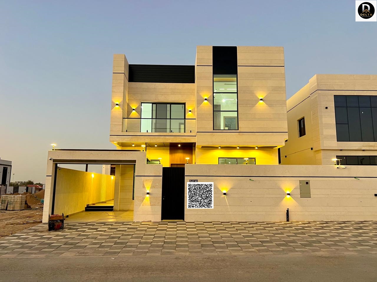 Own a European-style villa with custom finishing, located on a corner lot, with a price including registration and ownership fees. Prime location near