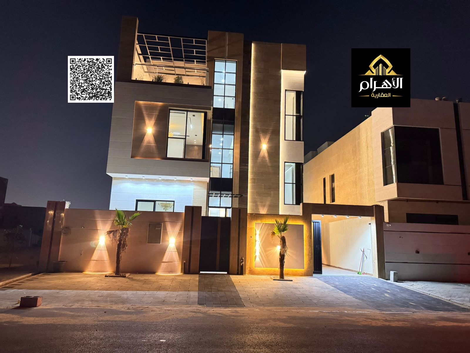 A villa with a price inclusive of registration, ownership fees, water, electricity, and air conditioning, ready to move into, in one of Ajman's most p