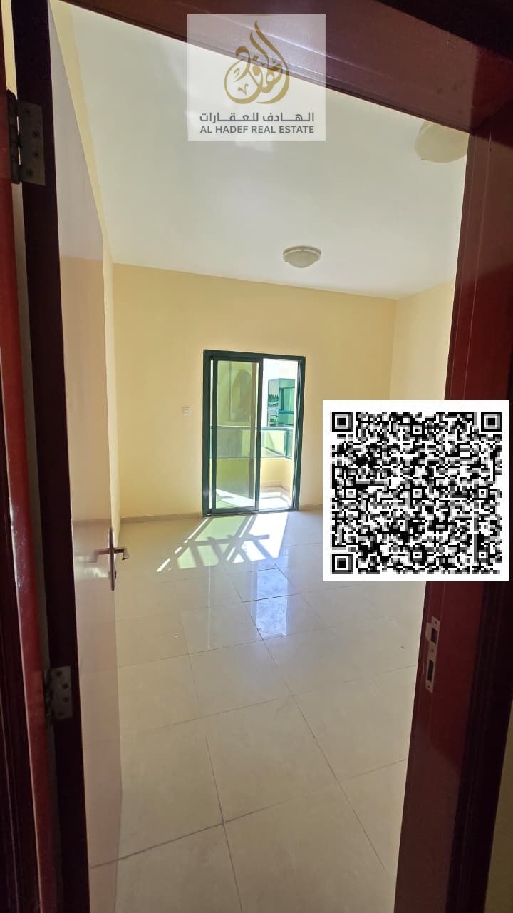 Two bedrooms and a living room with two. . bathrooms in Al Rashidiya Towers, opposite Nesto Hypermarket. 1566 sq ft. Separate living room and balcony.