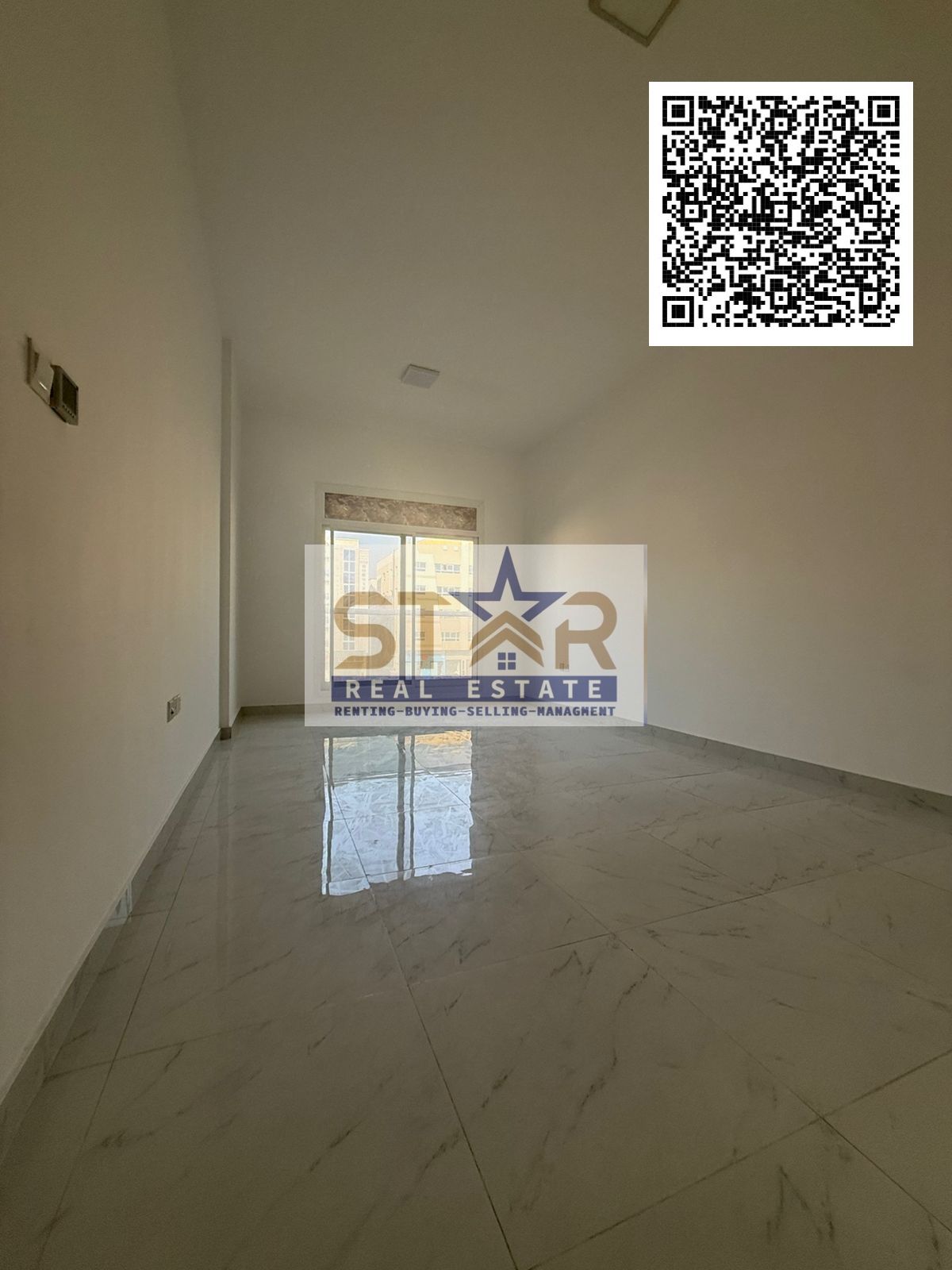 One-bedroom apartment with a living room for annual rent in Al Jurf 2, Ajman. Second occupant, with built-in wall cabinets.