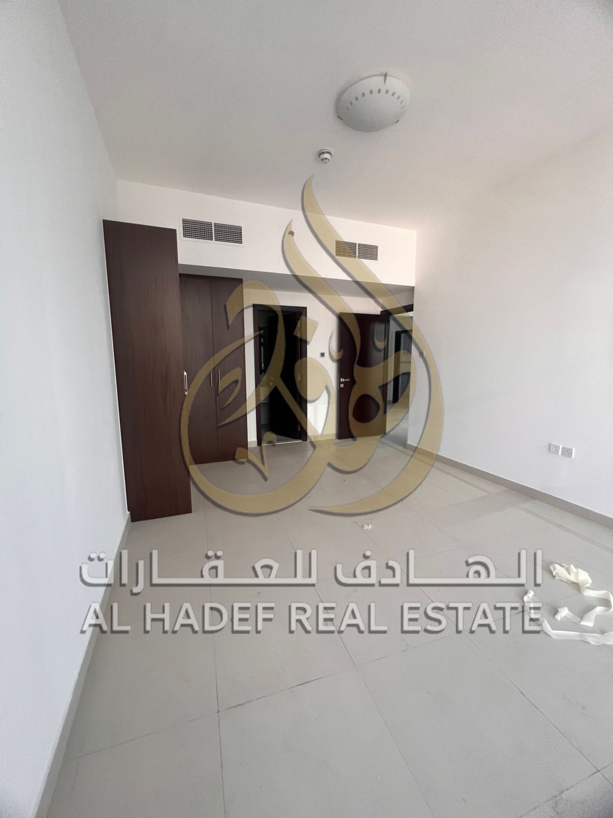 Two-bedroom apartment with a living room, maid's room, and balcony with direct sea view in Al Majaz 3 – Built-in wardrobes – Air conditioning included